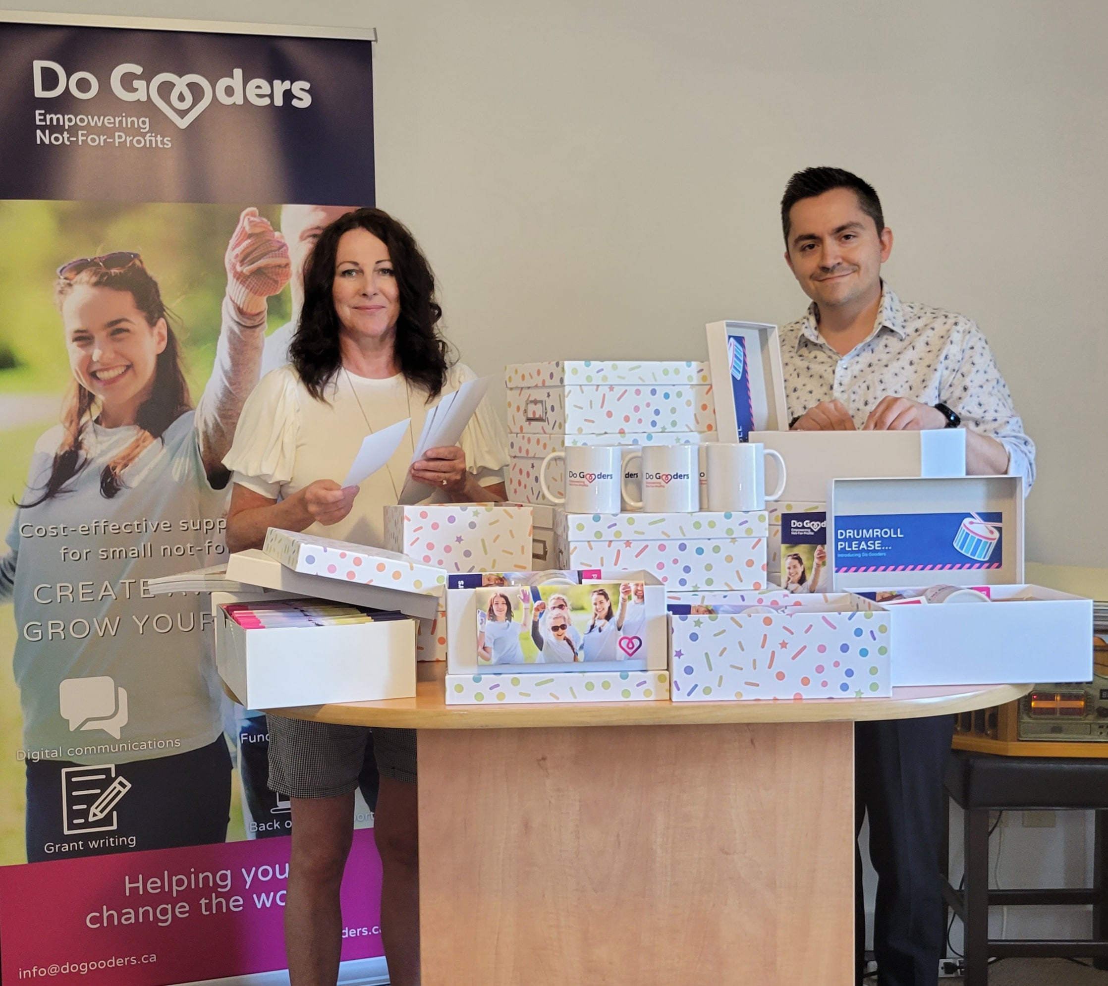 Kathleen Lemieux, CFRE and Stephen Somerville packing "VIP" boxes for the Do Gooders launch